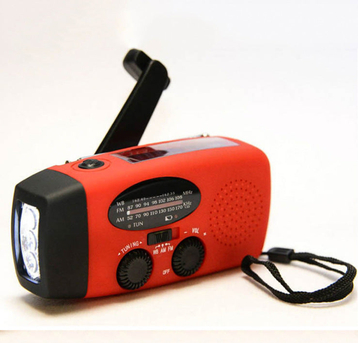 Solar hand crank USB charging radio flashlight